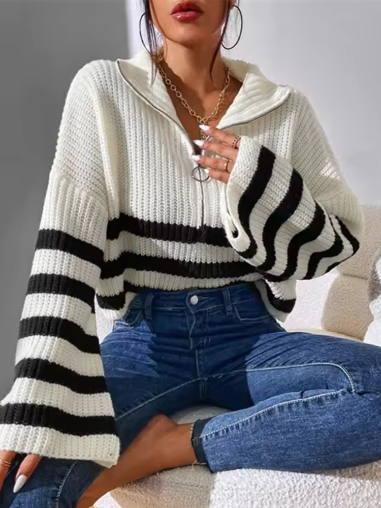 White half-zip knit sweater with black/white horizontal stripes and ribbed cuffs