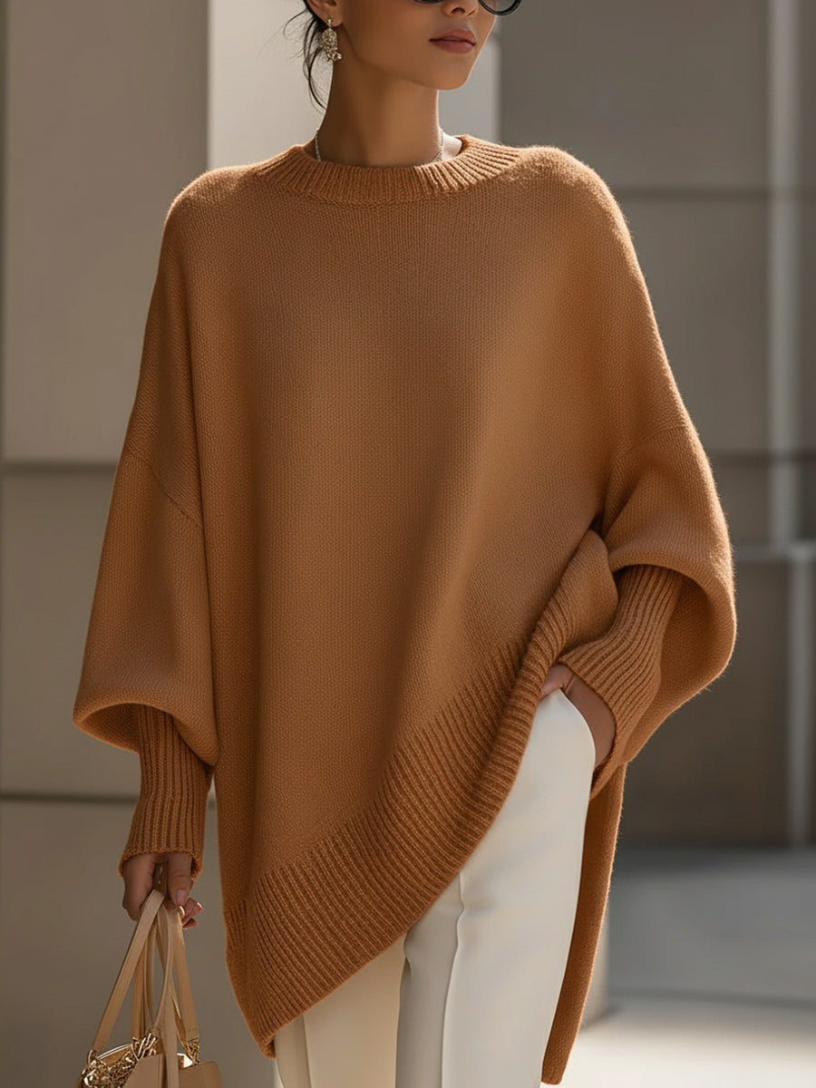 Camel brown oversized knit poncho with ribbed neck and asymmetrical drape