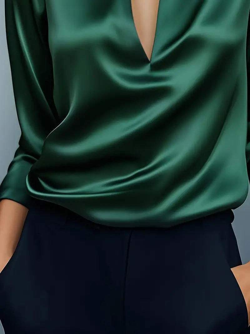 Dark green satin V-neck blouse with long sleeves and draped fabric front