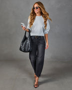 Heather grey crewneck knit sweater with long sleeves and relaxed fit