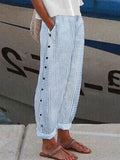 Women’s blue striped side-button casual pants with vertical front placket