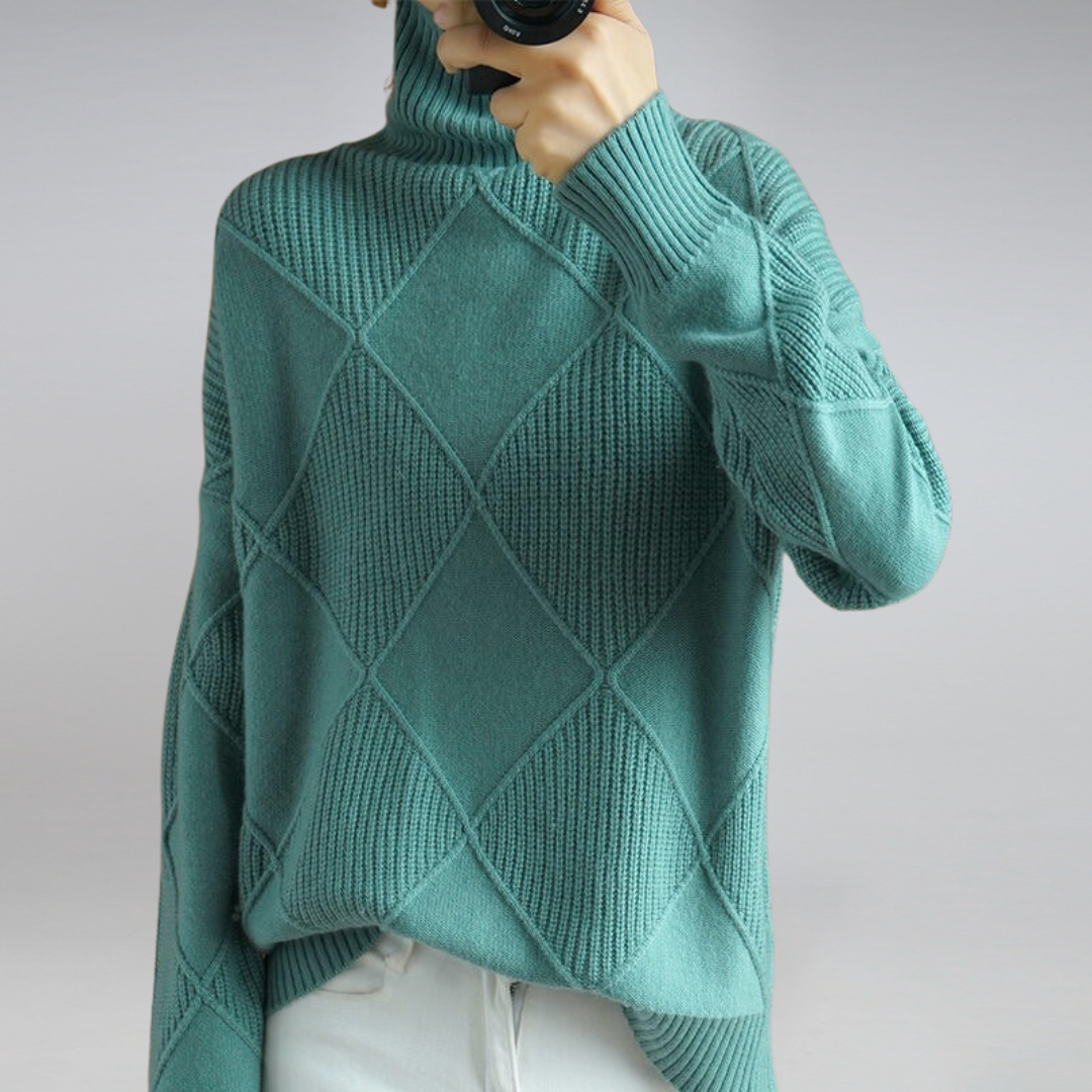 Women’s cashmere turtleneck sweater in turquoise, diamond knit pattern, ribbed collar and cuffs.