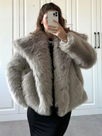 Oversized faux fur jacket in light gray with notched lapels and button front