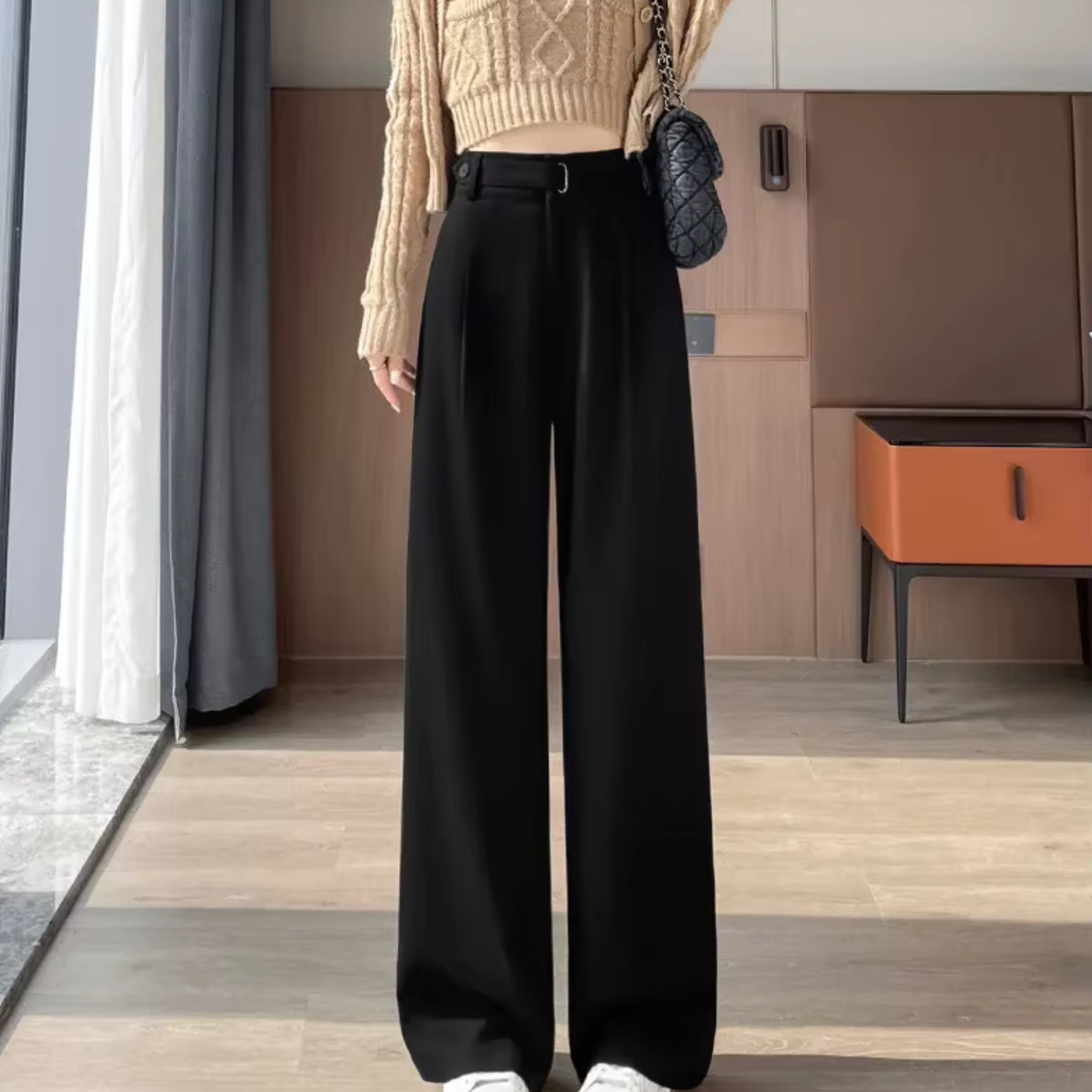 Women's high-rise wide-leg trousers, black with front pleats and wide straight legs.