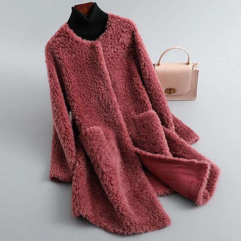 Burgundy shearling coat with ribbed black turtleneck, long sleeves, textured shag finish