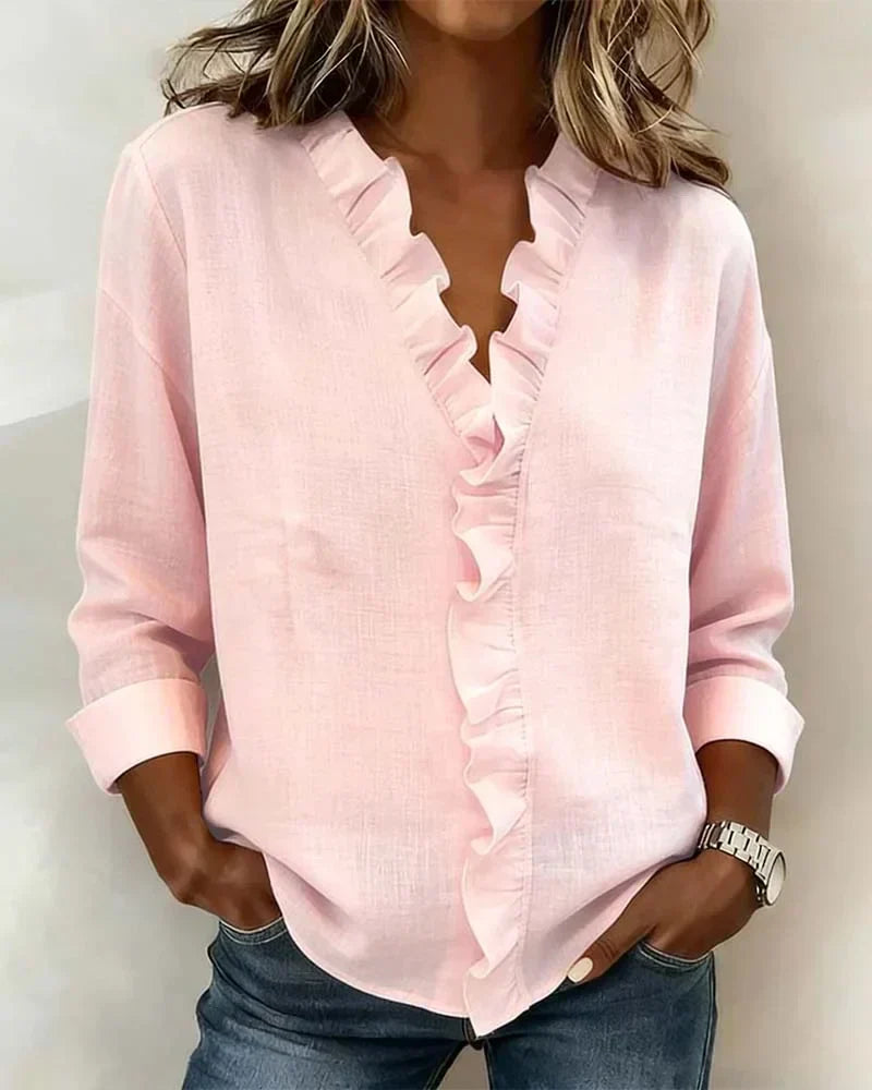 Light pink ruffle-trim V-neck blouse with long sleeves