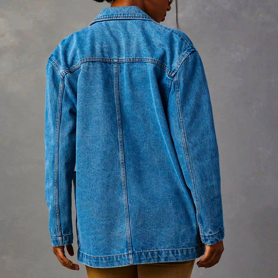 Light blue denim blazer back view with yoke seam and long sleeves