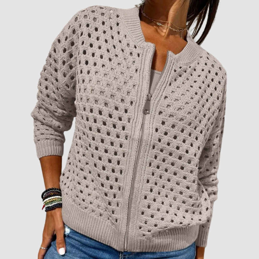 Beige knitted cardigan, full-zip front with openwork dot texture and ribbed hem.