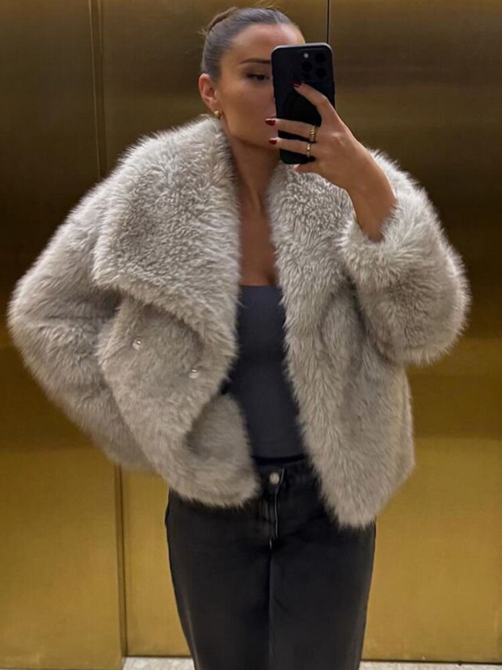 Oversized faux fur jacket in light beige with wide collar and button front