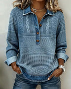 Light blue textured half-button sweatshirt with collar and dark button placket