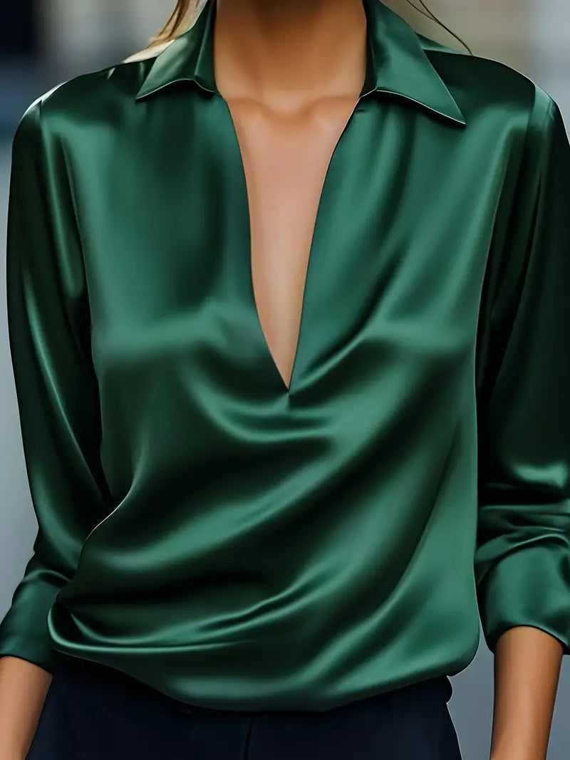 Emerald green V-neck satin blouse with pointed collar and long sleeves
