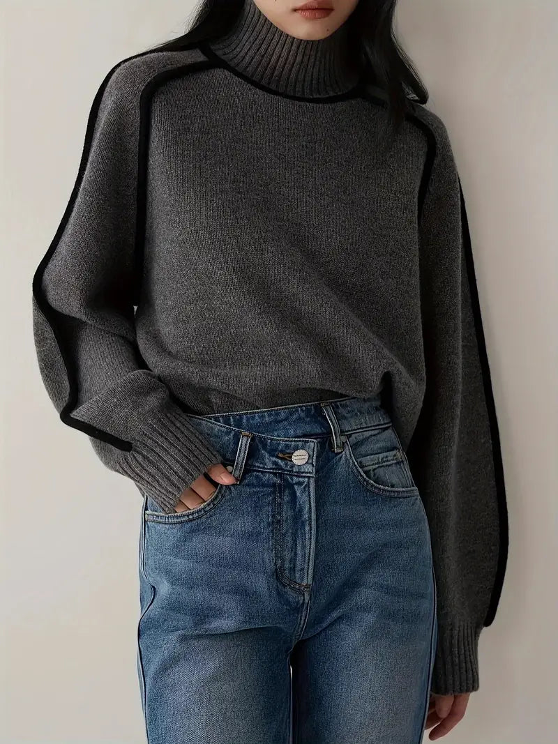 Dark gray turtleneck knit sweater with ribbed collar and cuffs