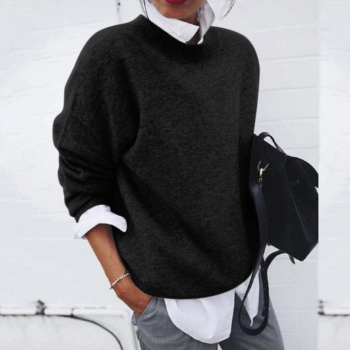 Black crew neck knit sweater with long sleeves, relaxed fit