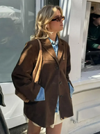 Women's brown suede-look button jacket, front view with lapels and button closure