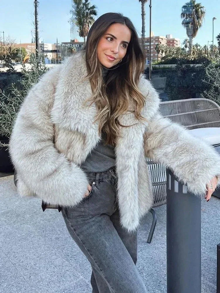Oversized faux fur jacket in light beige with wide collar and button front