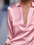 Light pink satin blouse with deep V-neck and long sleeves, pointed collar