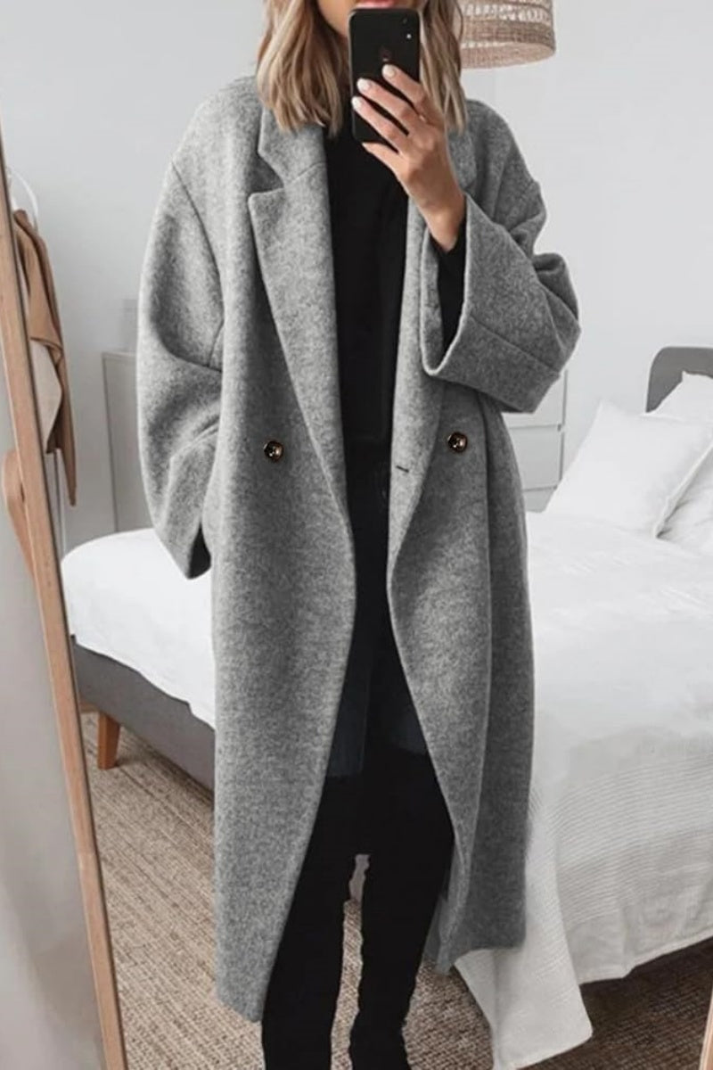 Women’s long wool double-breasted coat in gray with notch lapels, long sleeves, buttons