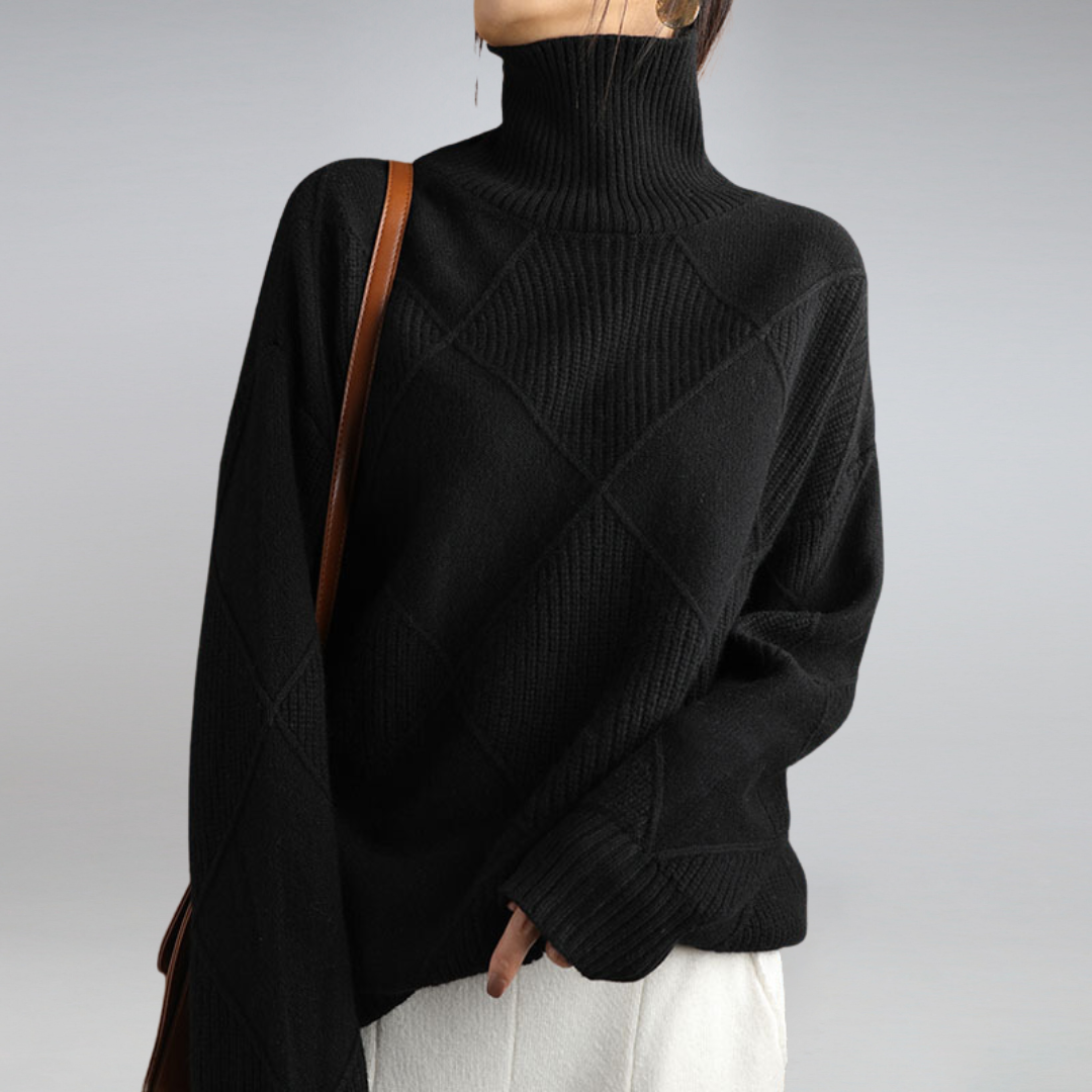 Women’s cashmere turtleneck sweater in black, diamond knit detail, ribbed high neck and sleeves.