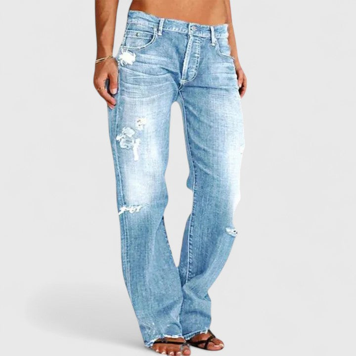 Light-wash distressed jeans with straight-leg fit and five-pocket design