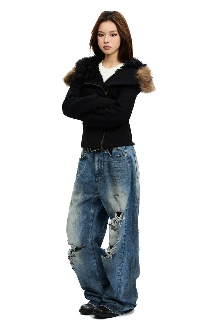 Black zip-up hoodie with black faux fur hood trim and tan faux fur on shoulders