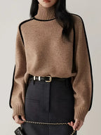 Brown turtleneck knit sweater with ribbed collar, cuffs, and hem