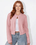 Pink cropped knit cardigan with round neck, button-front and ribbed cuffs
