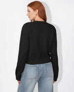 Black cropped knit cardigan with round neck and button-front, long sleeves
