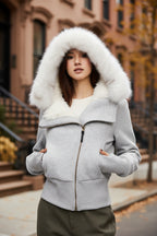 Light grey zip-up hoodie with white faux fur hood trim and front zipper