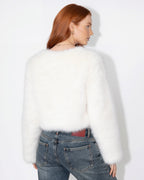 White cropped faux fur jacket with long sleeves, open front; rear view