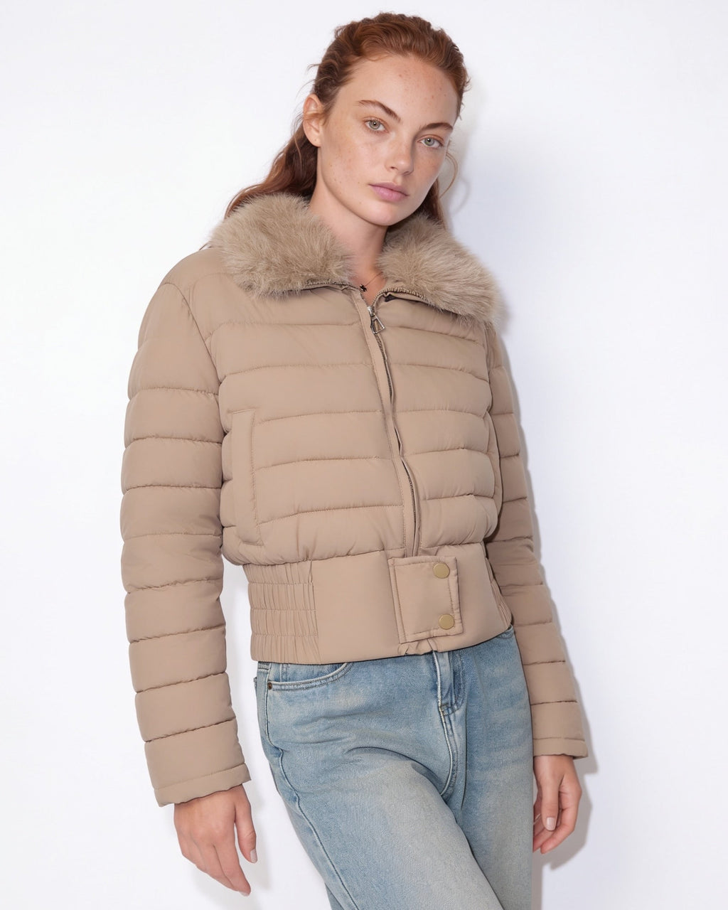 Beige cropped puffer jacket with faux fur collar, full front zipper, side buttons