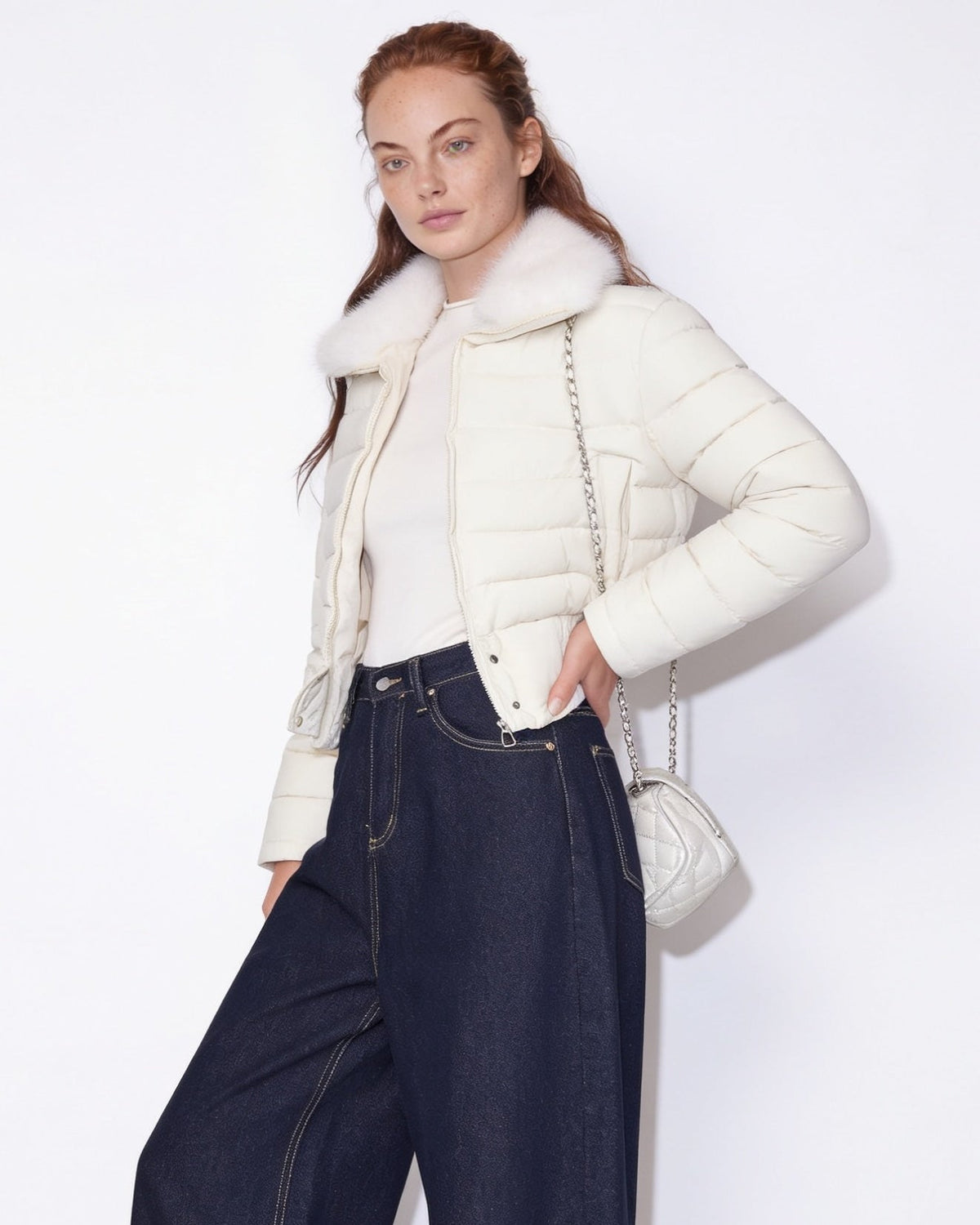 White cropped puffer jacket with faux fur collar and zip front