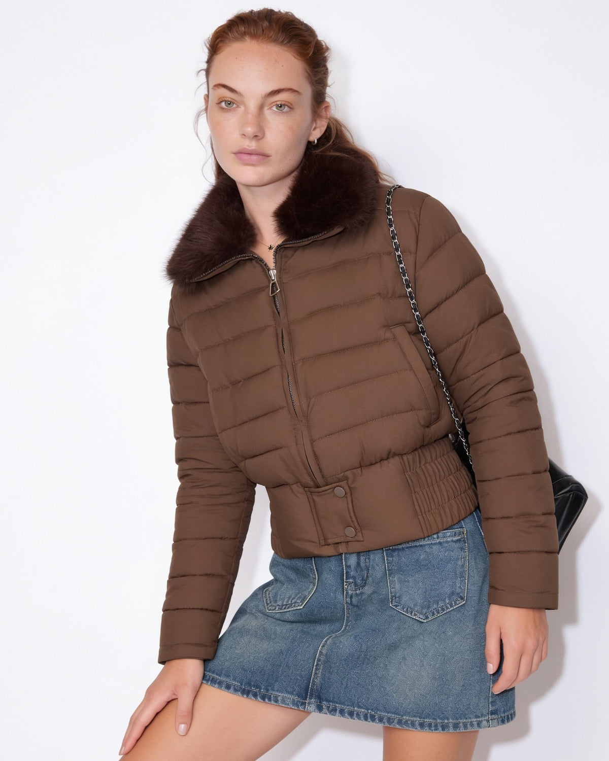 Brown cropped puffer jacket with faux fur collar, front zipper, quilted construction