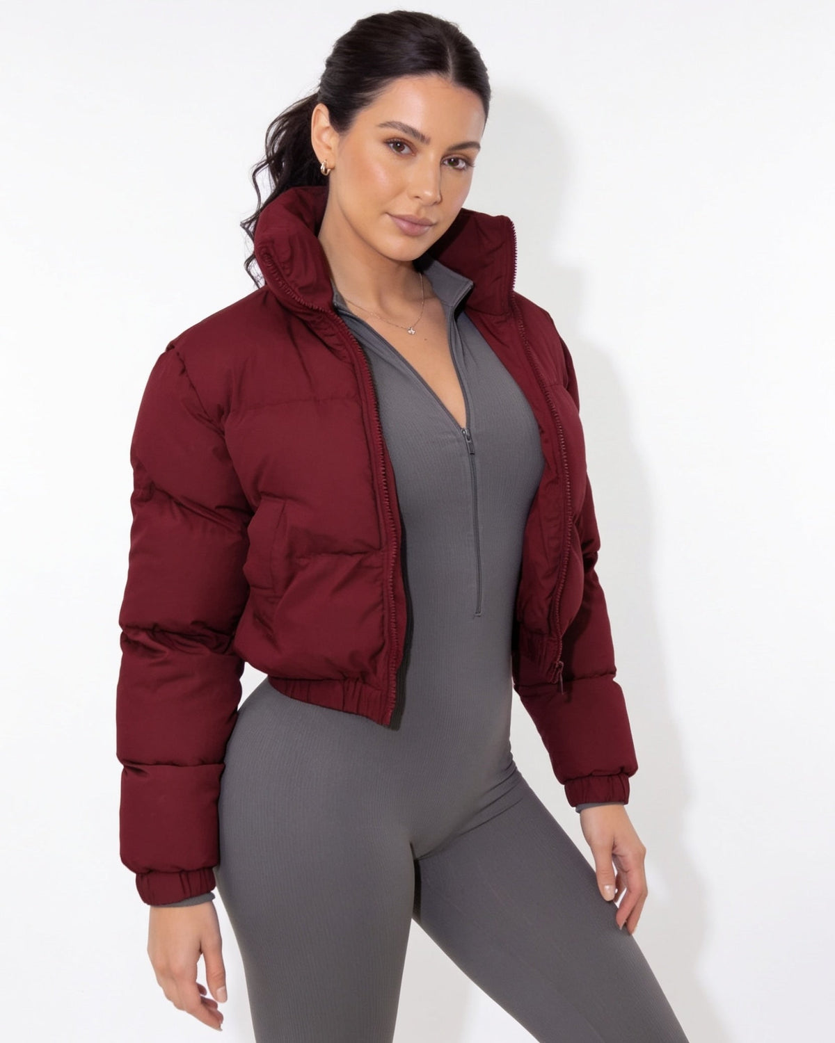 Burgundy cropped puffer jacket with funnel collar and zip front, long sleeves