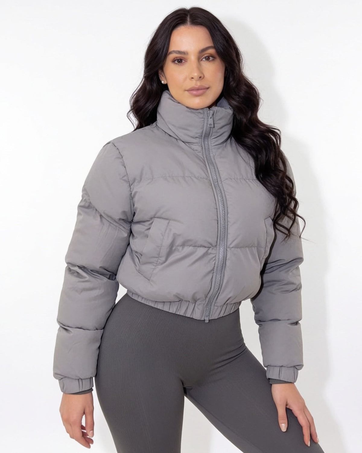Cropped funnel-collar puffer jacket in light grey, full-zip front, long sleeves