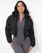Cropped funnel-collar puffer jacket in black, zip-front, quilted insulation, ribbed cuffs