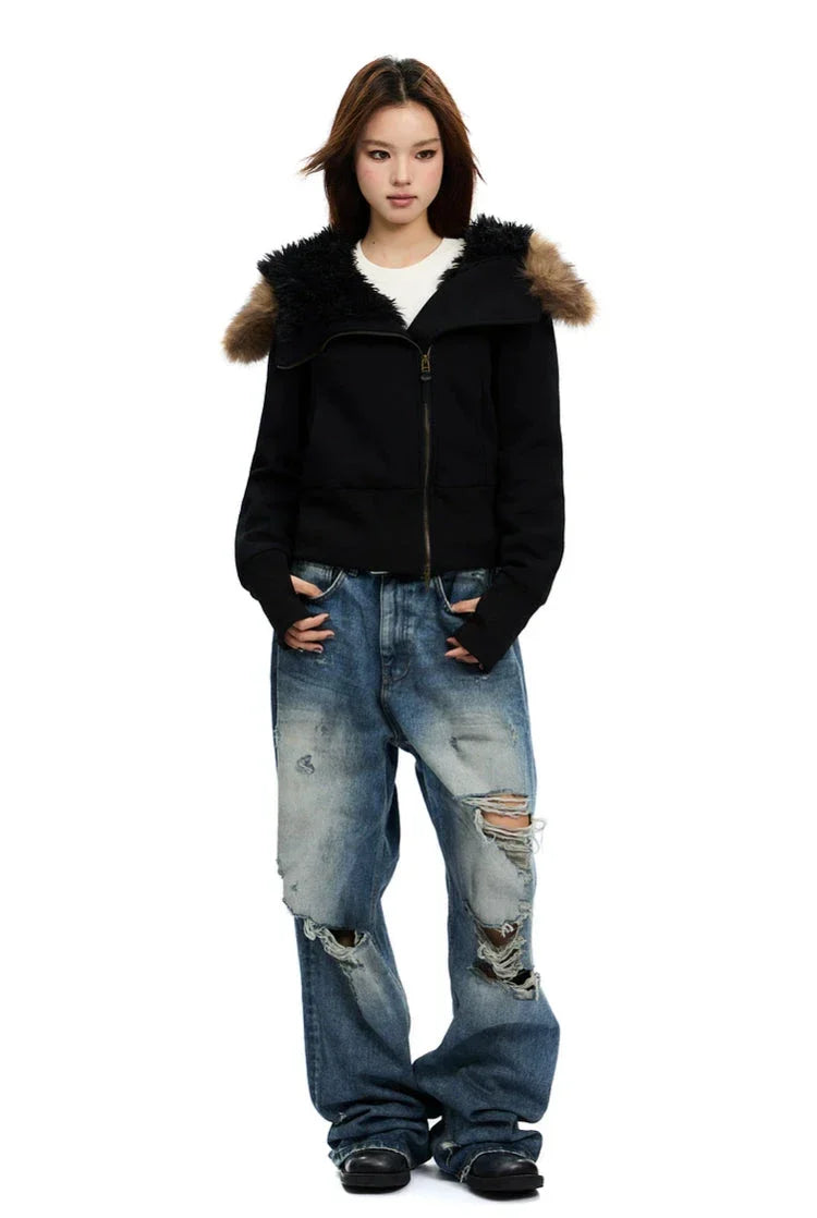 Black zip-up hoodie with black faux fur hood trim and tan fur shoulder panels