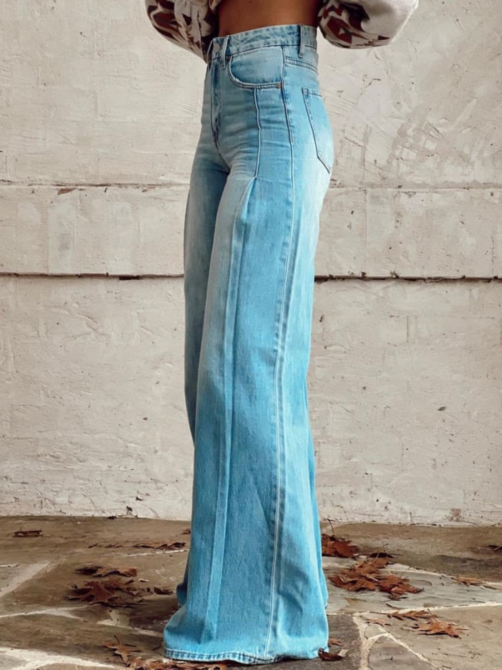 Light blue wide-leg jeans, side view, high waist with back pockets