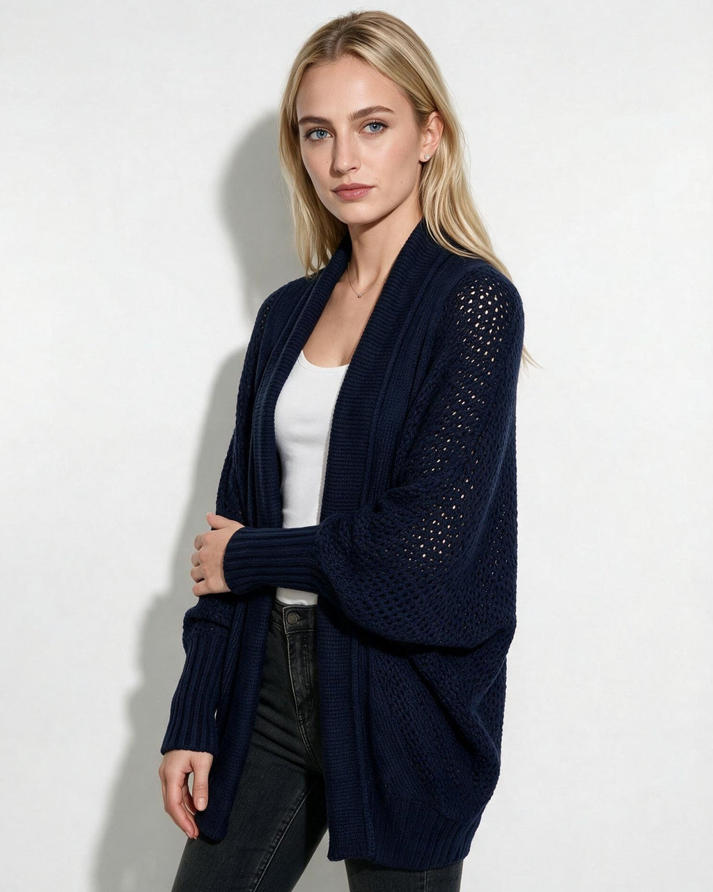 Navy knit longline open-front cardigan with dolman sleeves and textured knit detail