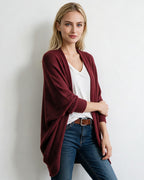 Women’s longline open-front cardigan with dolman sleeves, burgundy textured knit.