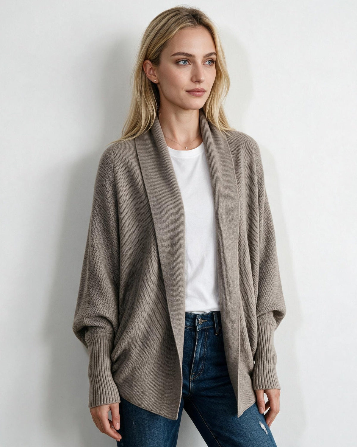 Beige longline open-front cardigan with dolman sleeves and ribbed sleeve cuffs