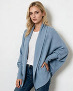 Light blue knit longline open-front cardigan with dolman sleeves