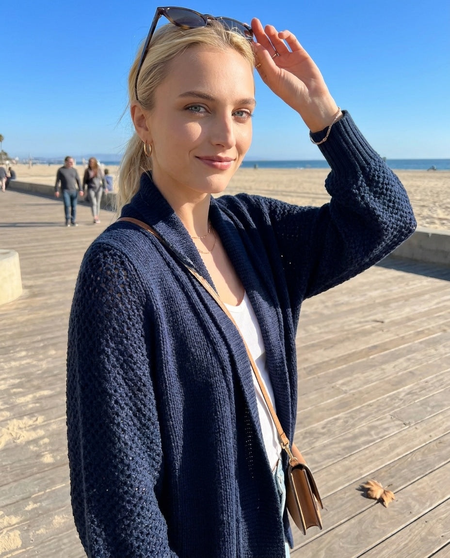 Navy knit longline open-front cardigan with dolman sleeves and shawl collar