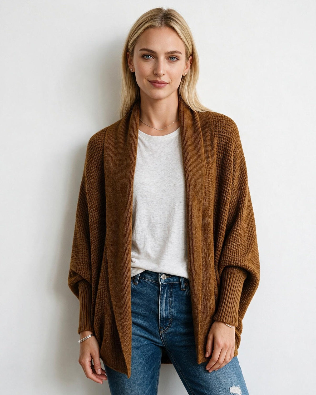Brown longline open-front cardigan with dolman sleeves and ribbed sleeve cuffs