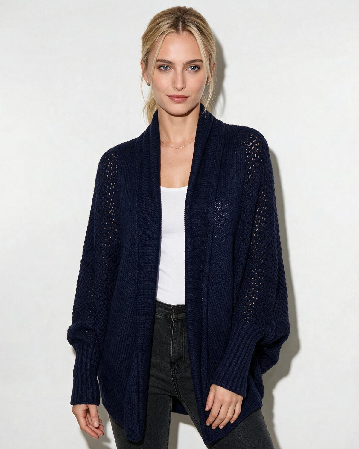 Navy longline open-front cardigan with dolman sleeves and textured knit finish