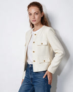 Women’s cream cropped collarless jacket, gold button front with four flap pockets, full view.