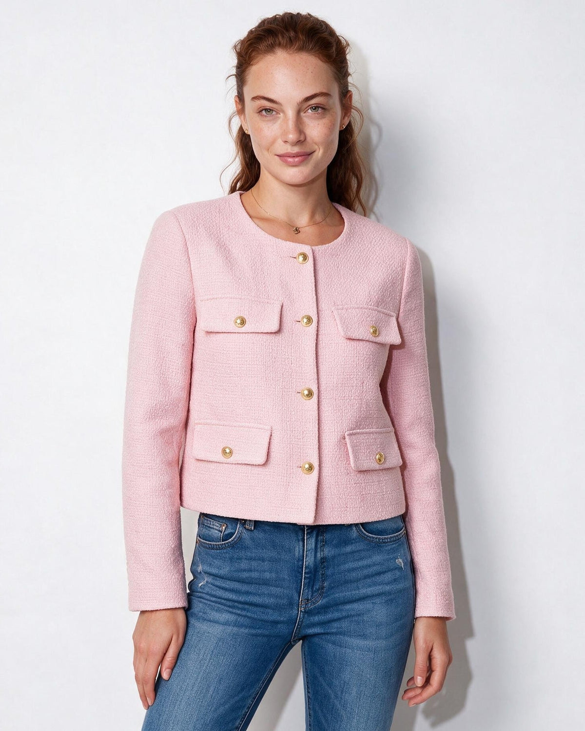 Cropped collarless jacket in light pink with gold buttons and four flap pockets