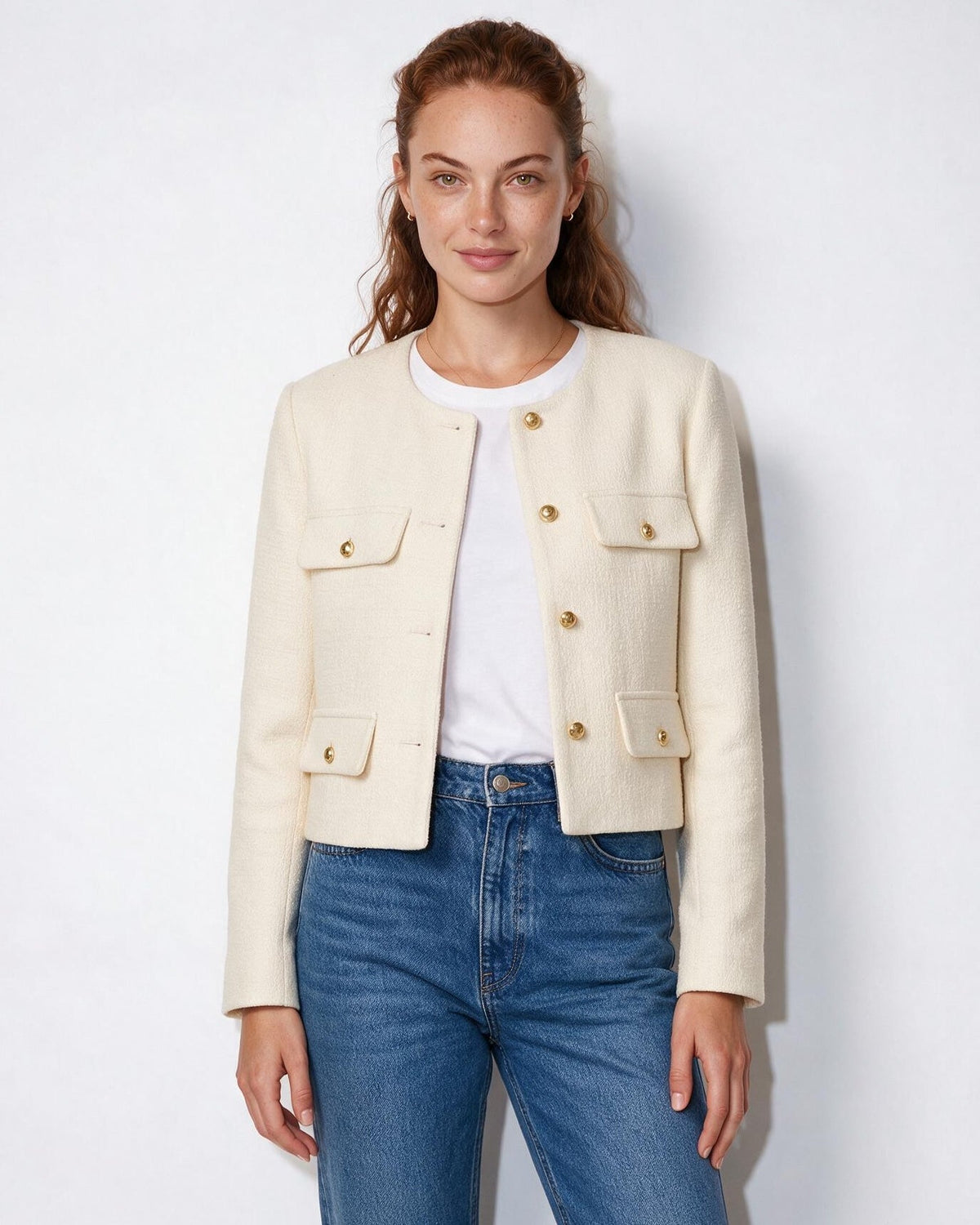 Cropped collarless jacket in beige with gold buttons and four flap pockets