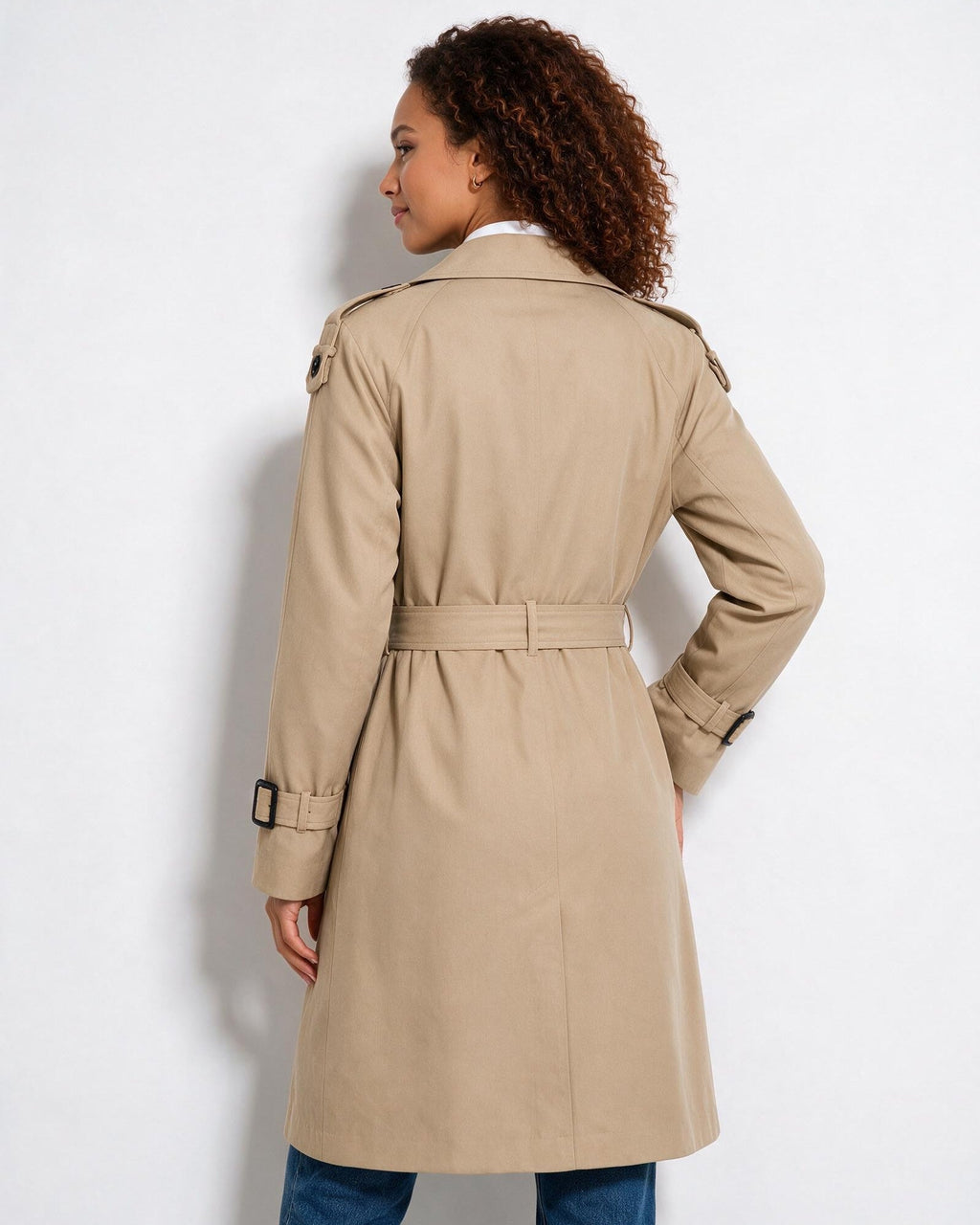 Beige longline belted coat with faux-shearling collar, epaulets, and button cuffs