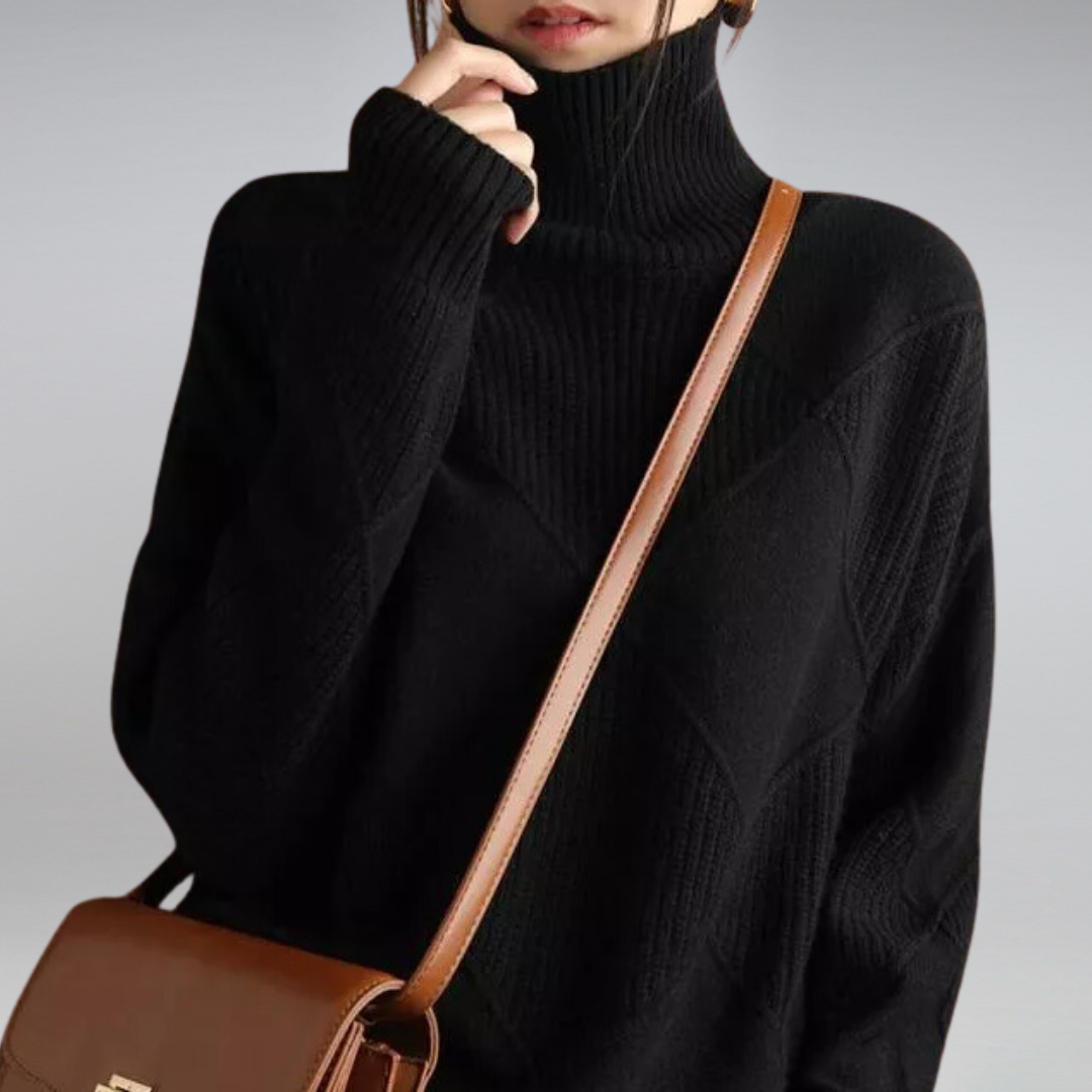 Women’s cashmere turtleneck sweater in black, diamond knit detail, ribbed turtleneck and cuffs.