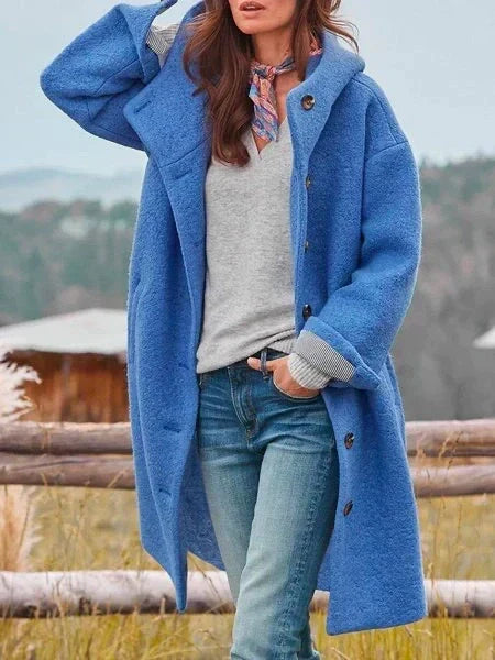 Women’s soft wool coat, blue hooded front with button closure and pockets.
